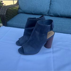 Gently used blue suede boots with straps